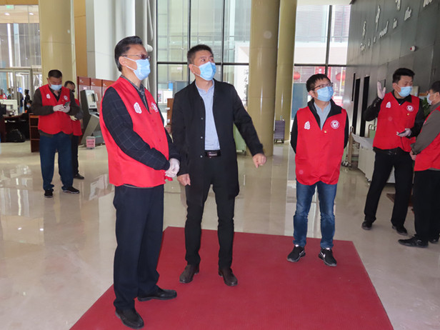 区人大常委会主任孟宪伟带队参加志愿者服务活动