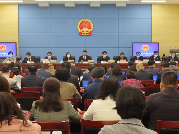 区十八届人大常委会召开第27次会议